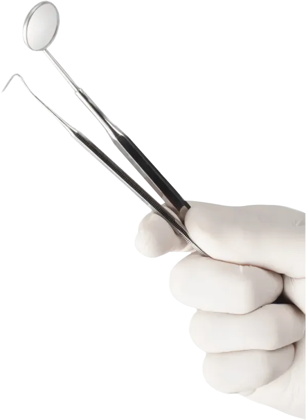 A gloved hand holding a dental mirror and explorer tool against a white background.
